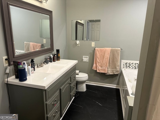 bathroom with a tub to relax in, vanity, toilet, and tile patterned floors