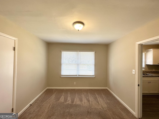 view of carpeted spare room