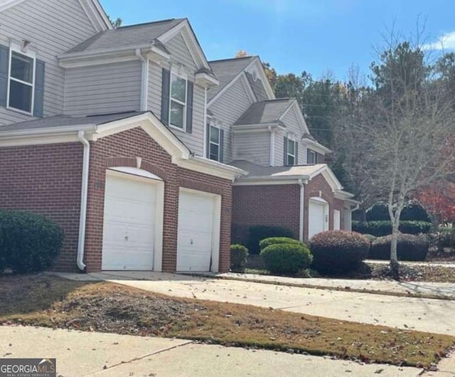 view of home's exterior with a garage