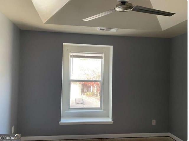 unfurnished room with ceiling fan