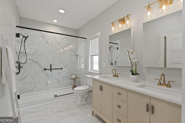 bathroom featuring vanity and a shower with shower door