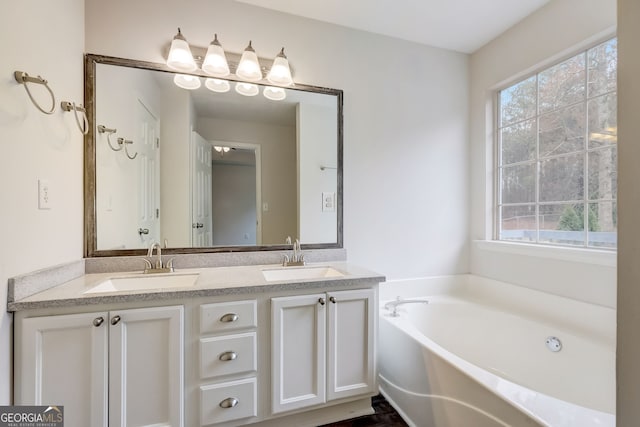 bathroom featuring a bathtub and vanity