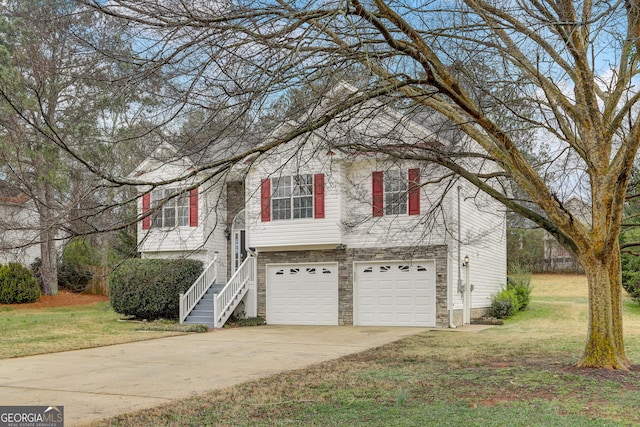 view of front of house with a garage and a front yard