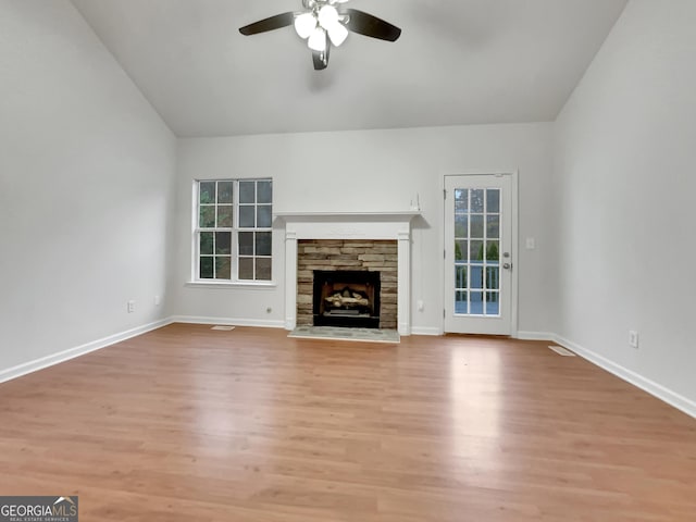 unfurnished living room with ceiling fan, light hardwood / wood-style flooring, and plenty of natural light