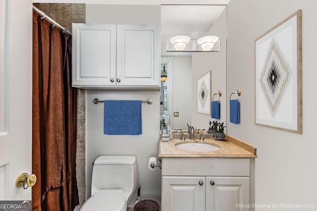 750 Park Ave NE Unit 8E, Atlanta, GA 30326 - bathroom featuring vanity and toilet