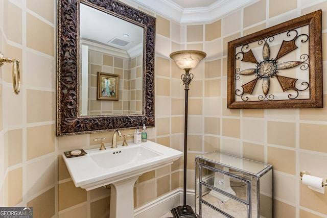 750 Park Ave NE Unit 8E, Atlanta, GA 30326 - bathroom featuring ornamental molding and tile walls