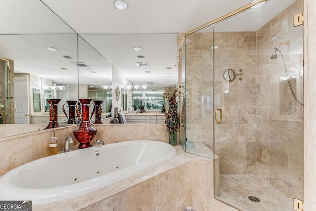 750 Park Ave NE Unit 8E, Atlanta, GA 30326 - full bath featuring a whirlpool tub and a stall shower