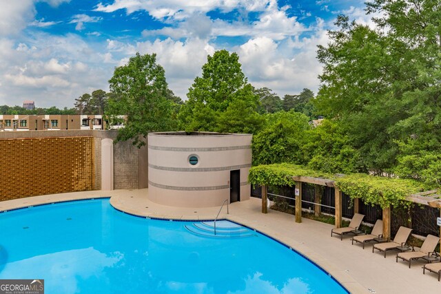 750 Park Ave NE Unit 8E, Atlanta, GA 30326 - community pool with a patio area