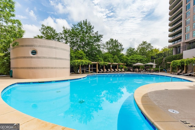 750 Park Ave NE Unit 8E, Atlanta, GA 30326 - community pool featuring view of scattered trees