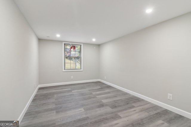 spare room with light wood-type flooring