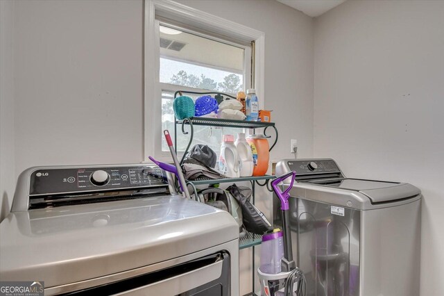 laundry area featuring separate washer and dryer