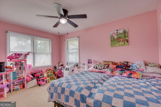 carpeted bedroom with ceiling fan