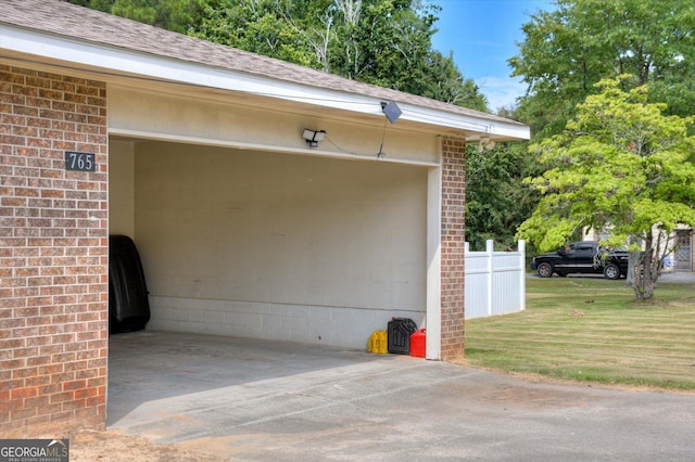 garage with a yard