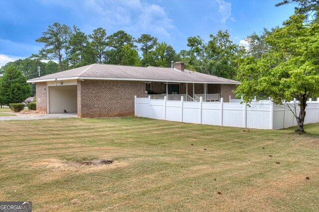 view of home's exterior with a yard