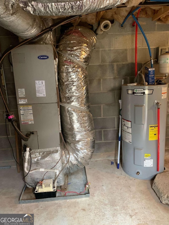 utility room featuring electric water heater