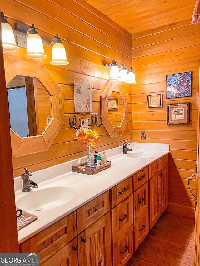 bathroom with wood walls, vanity, wooden ceiling, and hardwood / wood-style flooring