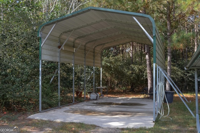 view of parking / parking lot featuring a carport