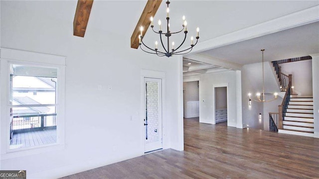 unfurnished dining area featuring beamed ceiling, wood-type flooring, and an inviting chandelier