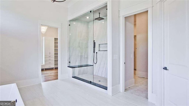 bathroom featuring a tile shower