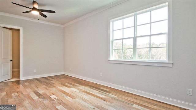 unfurnished room featuring light hardwood / wood-style flooring, ceiling fan, and ornamental molding