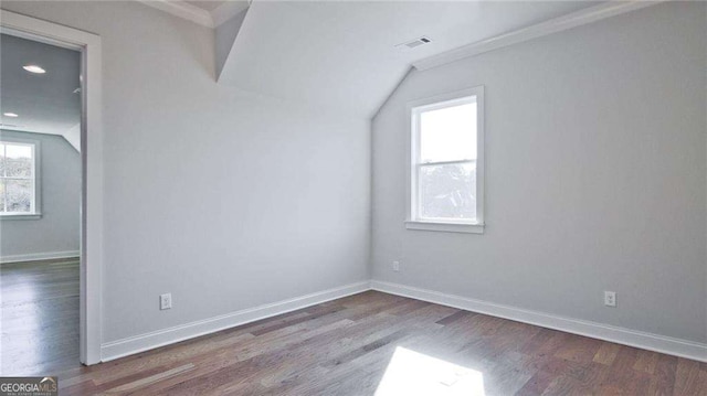 bonus room with hardwood / wood-style floors