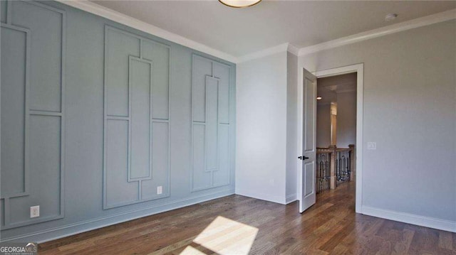 unfurnished bedroom featuring a closet, crown molding, and dark hardwood / wood-style flooring