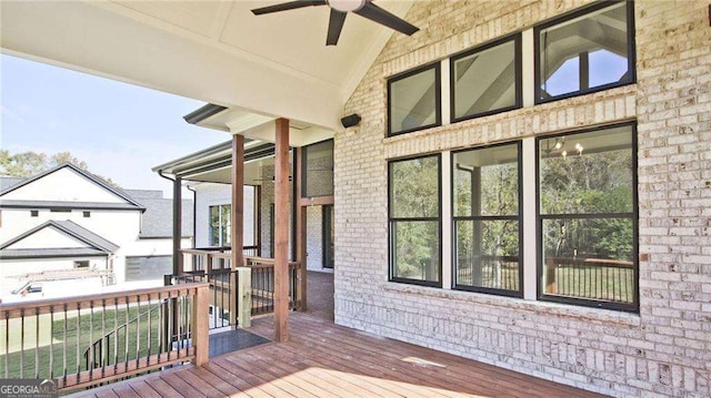 wooden deck with ceiling fan