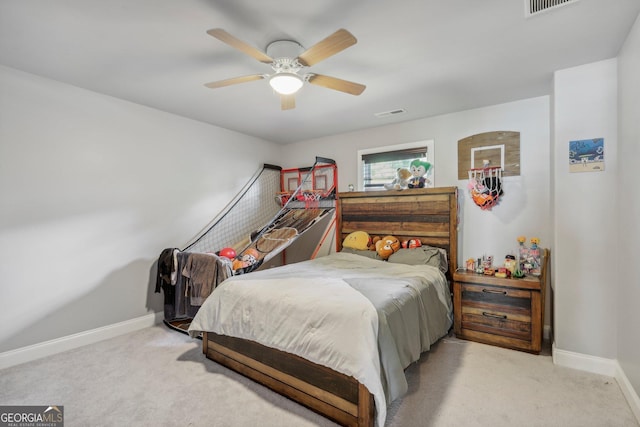 bedroom with light colored carpet and ceiling fan