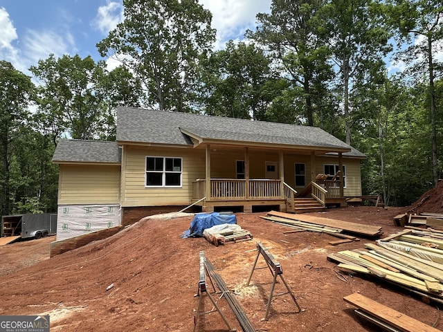 367 Cherokee Trl, Forsyth, GA 31029 - view of front facade with a shingled roof and covered porch