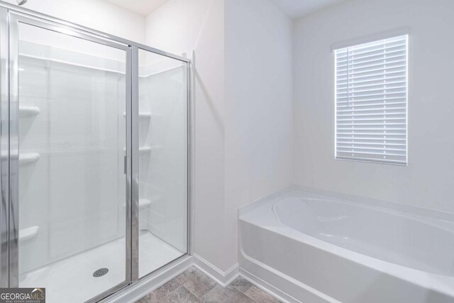 bathroom with plus walk in shower