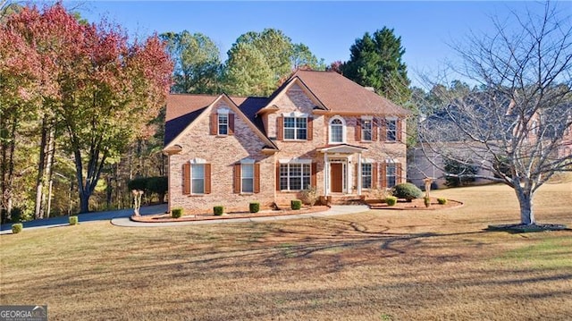 view of front of home featuring a front yard