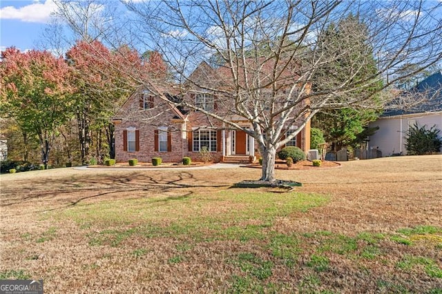 view of front of house featuring a front lawn