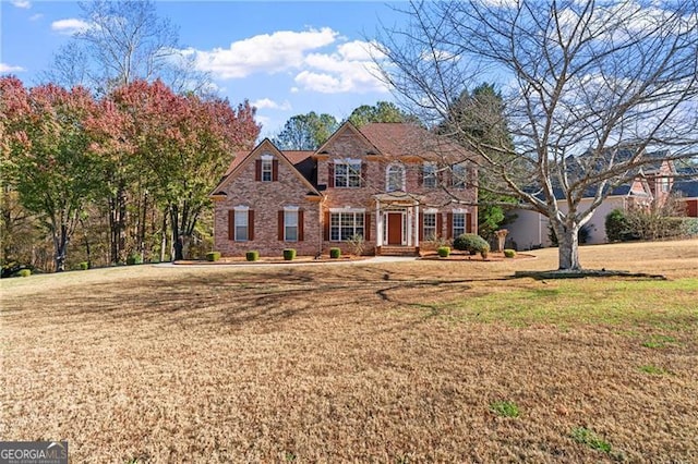 view of front of home with a front yard