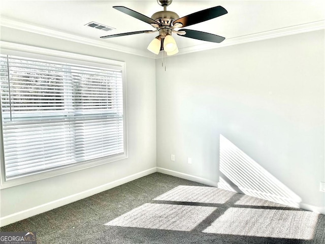 empty room with carpet, ceiling fan, and crown molding