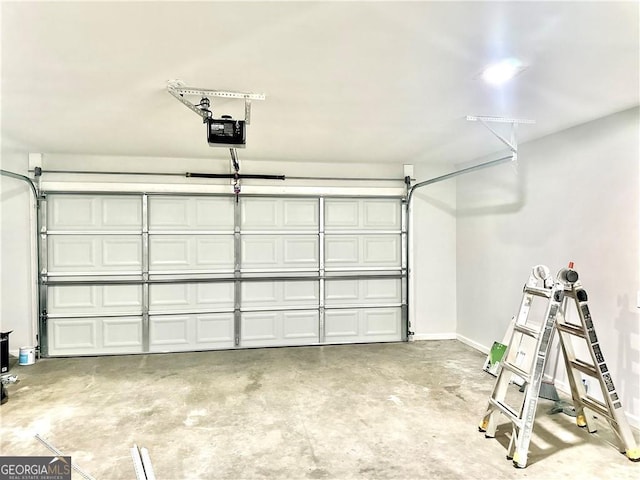 garage featuring a garage door opener