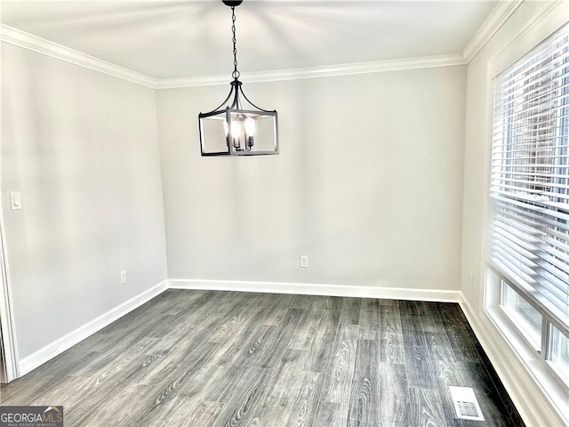 unfurnished dining area with dark wood-type flooring, a notable chandelier, and ornamental molding