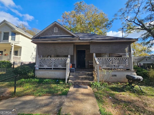 bungalow-style house featuring covered porch