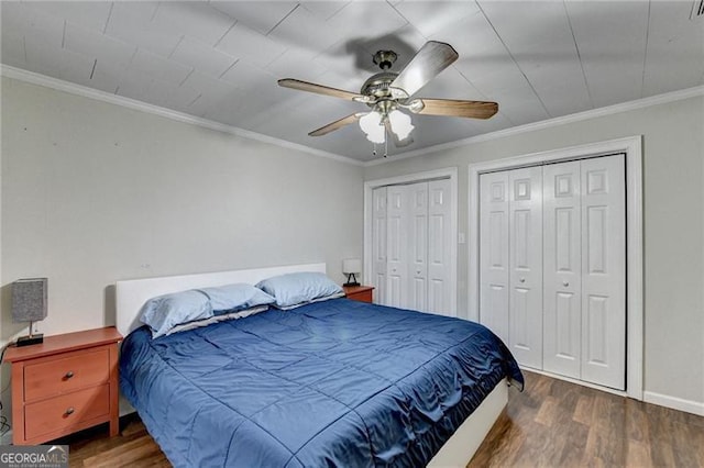 bedroom with crown molding and dark wood-type flooring