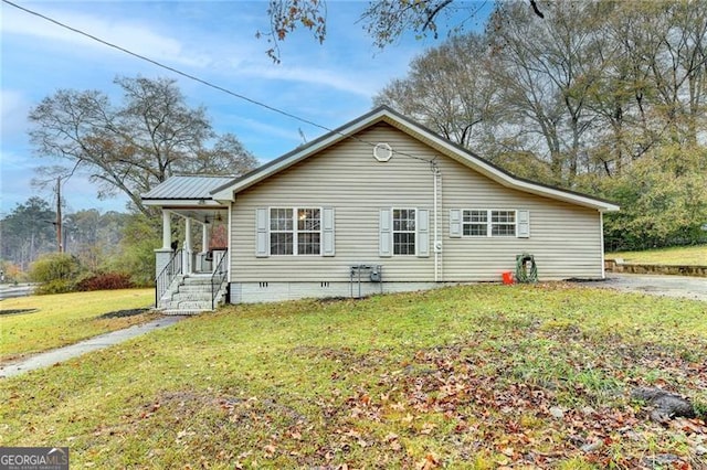 view of property exterior featuring a yard