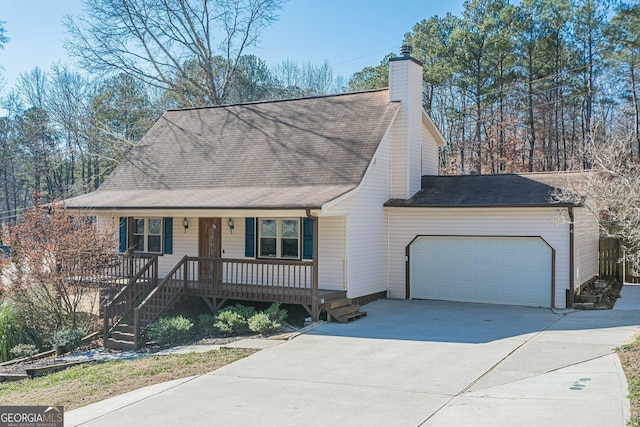 view of front of house with covered porch and a garage