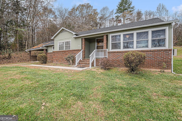 ranch-style house with a front lawn