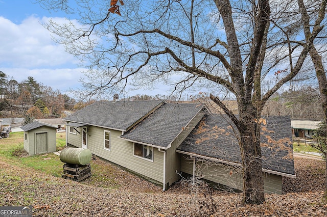 view of property exterior featuring a shed