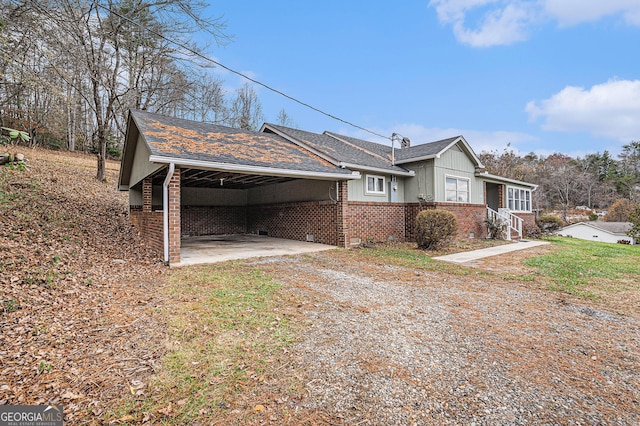 view of property exterior featuring a carport