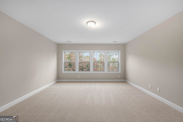 empty room with light carpet