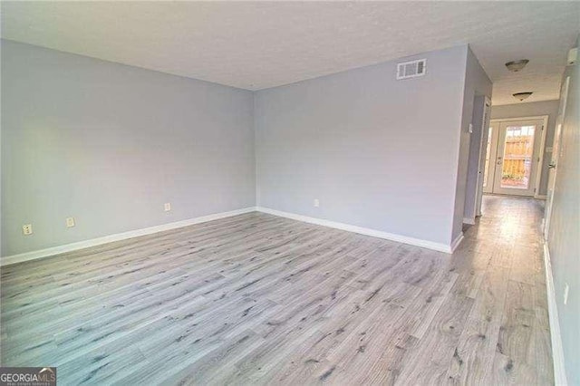 empty room featuring light wood-type flooring