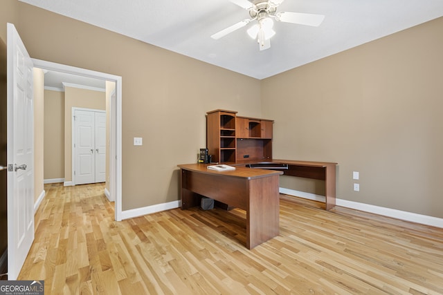 office with ceiling fan and light wood-type flooring