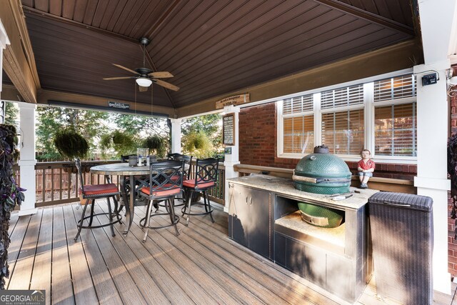 wooden deck with ceiling fan