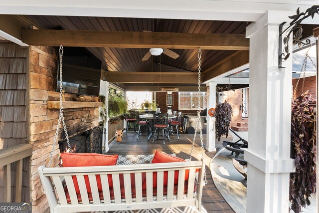 view of patio featuring ceiling fan