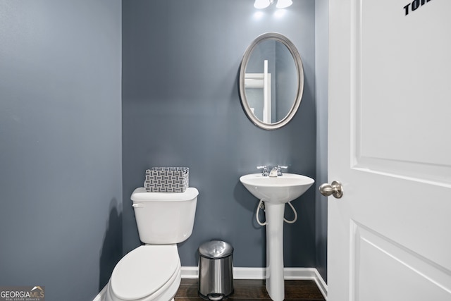 4192 Integrity Way, Powder Springs, GA 30127 - half bathroom featuring toilet, wood finished floors, and baseboards