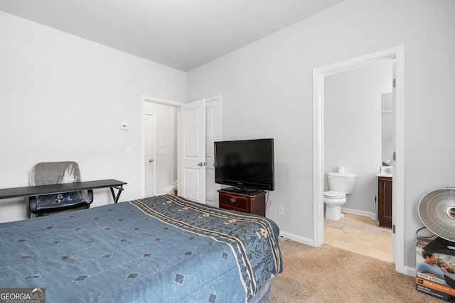 4192 Integrity Way, Powder Springs, GA 30127 - bedroom with light carpet, baseboards, and ensuite bath